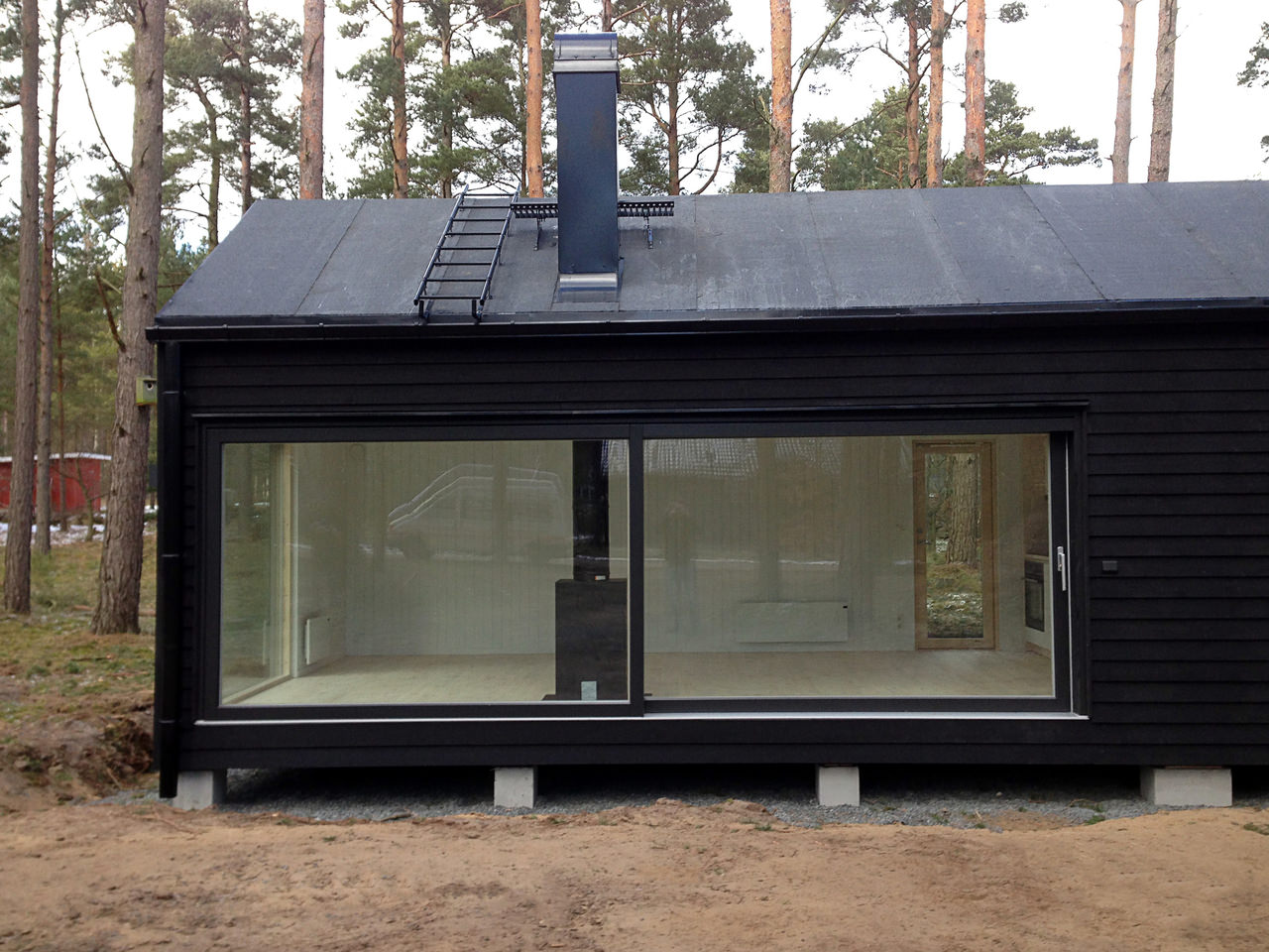 Interior and Exterior Options_modular houses_Baltic House Systems_fritidshus-modulhus-bred-skjutdörr-kamin